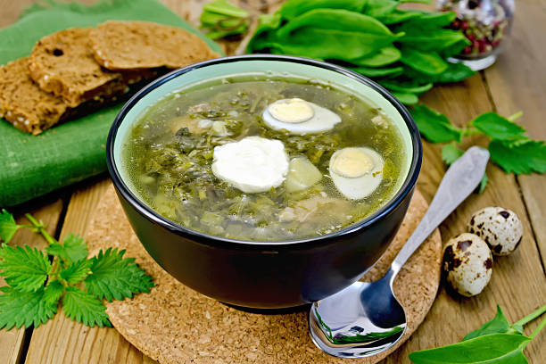 istock Soup green of sorrel and nettle with quail eggs 525352005