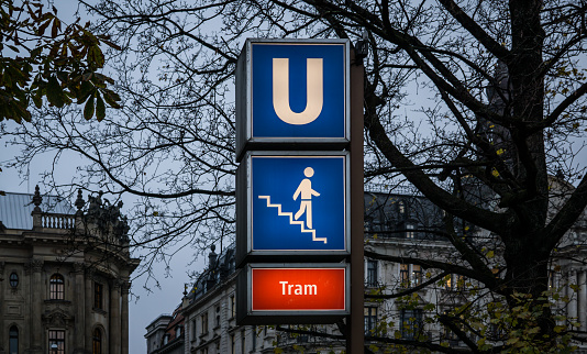 Sign in Munich for the Underground and a underpass to the Tram
