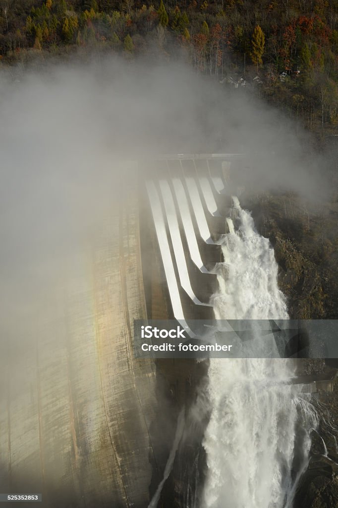 The dam of Verzasca on the italian part of Swtzerland The dam of Verzasca on the italian part of Swtzerland with open the floodgates Architecture Stock Photo