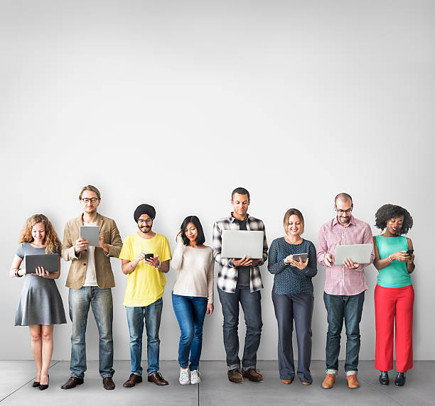 istock Group of People Connection Digital Device Concept 525352930