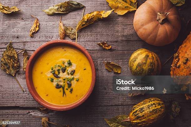 Pumpkin Soup On A Wooden Table Stock Photo - Download Image Now - Autumn, Bowl, Brown