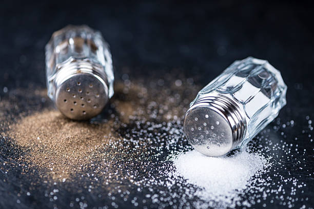 istock Salt and Pepper Shakers on a slate slab 525355180