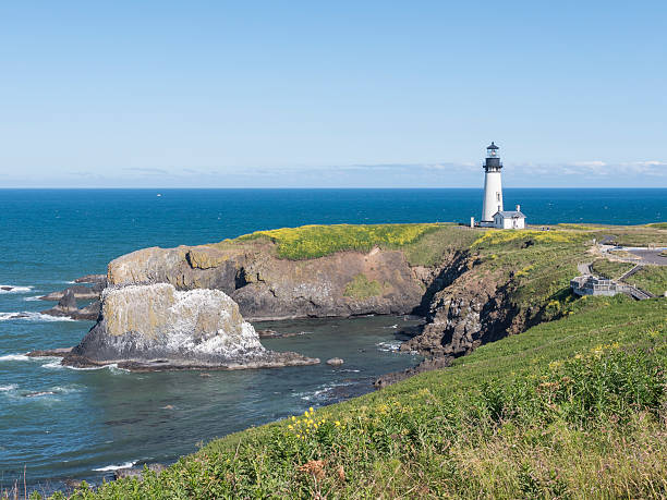 istock Yaquina Head lighthouse and cove, Oregon 525355452