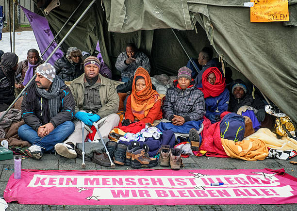 Munich, Germany - November 24, 2014: refugees in a hunger strike in munich - Sendlingertor. the refugees demonstrate for more rights and against racism. The photo shows the third day