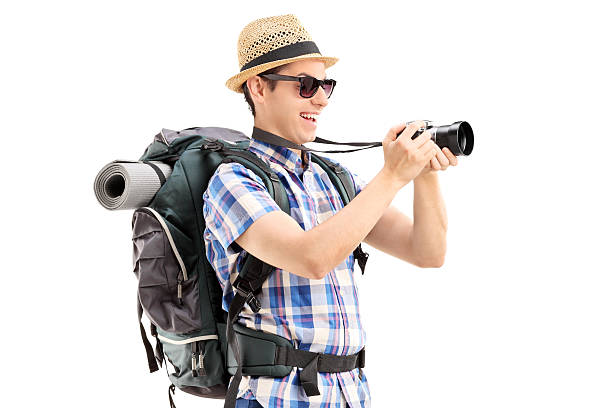 istock Male tourist taking a picture with a camera 525358023