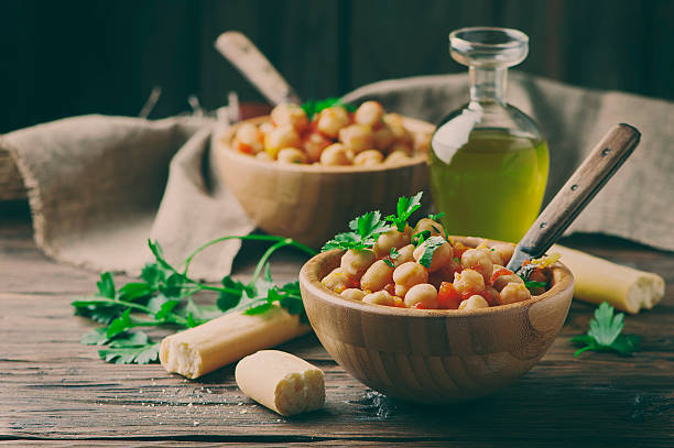 istock Vegeterian cooked chickpea with tomato and parsley 525359576