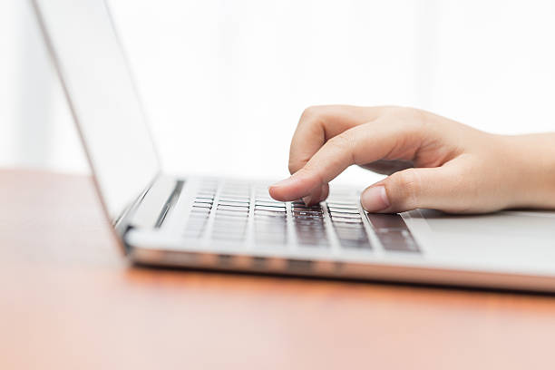 istock Hand on computer keyboard for business concept background. 525361060