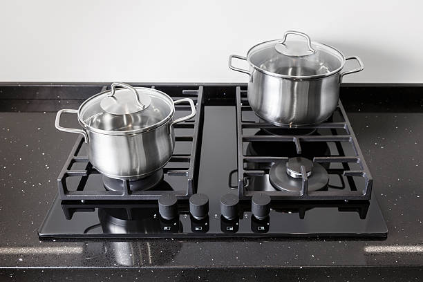 istock Two pots on a gas stove 525362450