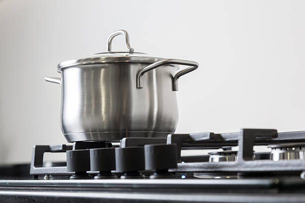 istock Pot on a gas stove 525362560