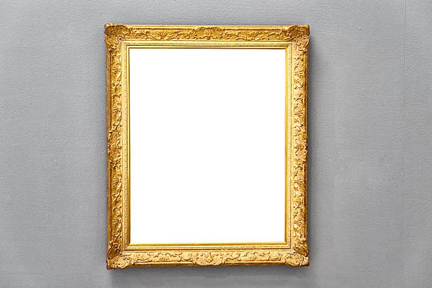 istock golden antique picture frame on gray wall 525362834