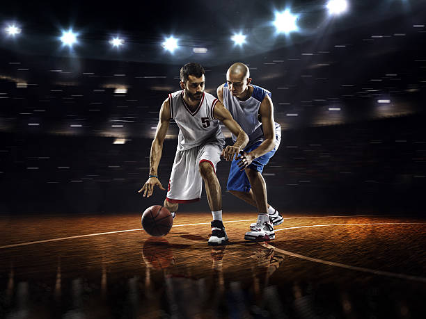 istock Two basketball players in action 525364427