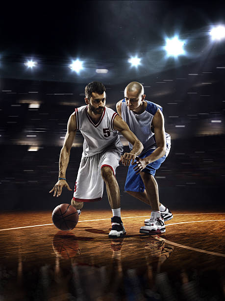 istock Two basketball players in action 525364429