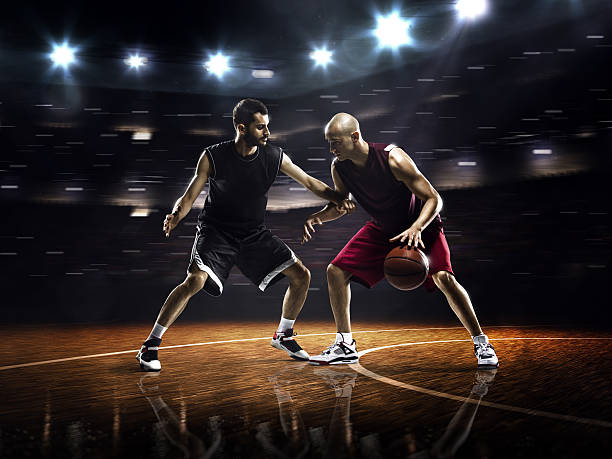 istock Two basketball players in action 525364459