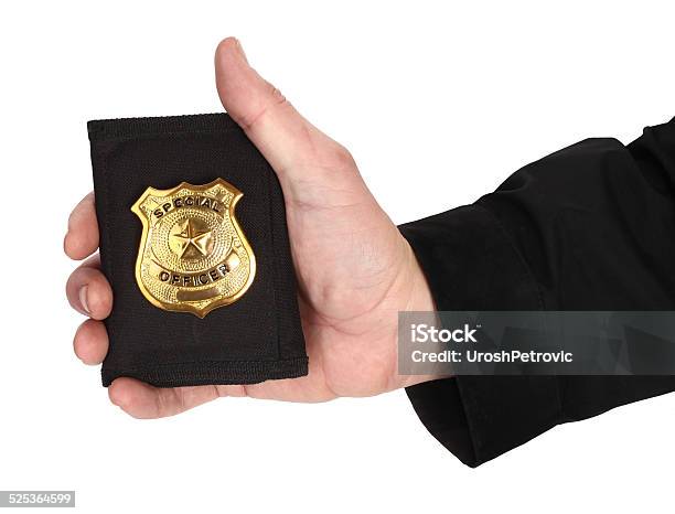 Man Hand Is Holding Golden Special Officer Badge Stock Photo - Download Image Now - Police Badge, Showing, Badge