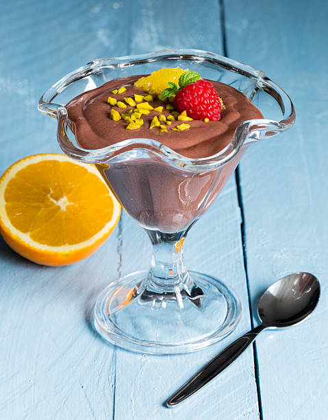 istock Chocolate pudding dessert with orange and pistachio 525364761