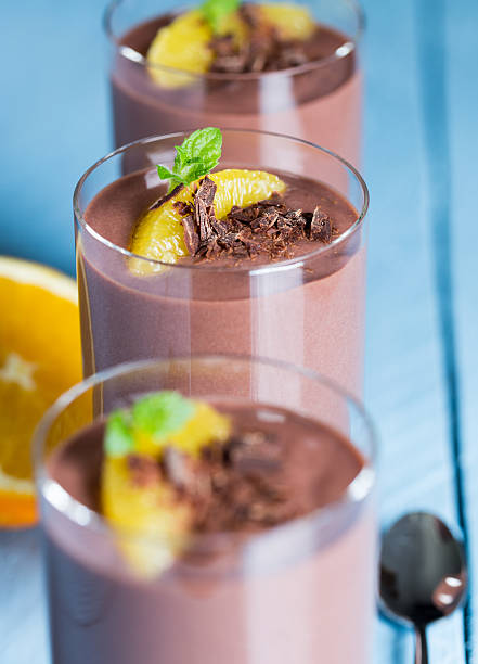 istock Chocolate pudding dessert with orange and pistachio 525364773
