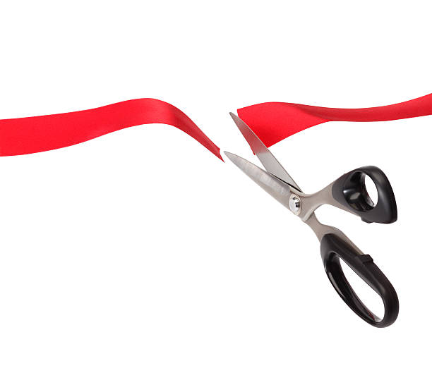 istock Red Ribbon Cutting Ceremony/with clipping path 525365420