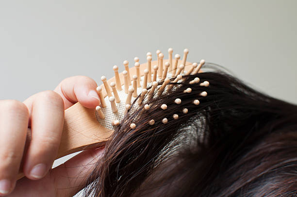 istock Hair with hairbrush 525365616