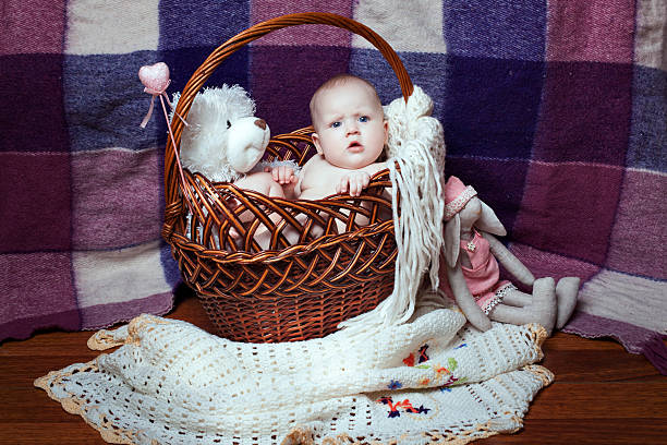 istock Beautiful baby in a basket 525366656