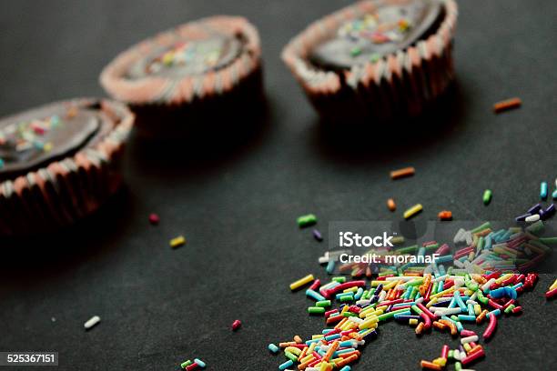 Rainbow Sprinkles Stock Photo - Download Image Now - Baking, Black Background, Cake