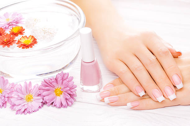istock french manicure with colorful chrysanthemum 525368909