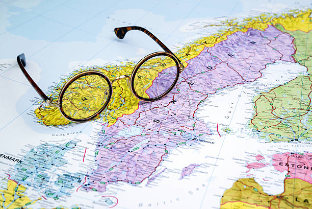 istock Glasses on a map of europe - Norway 525369197