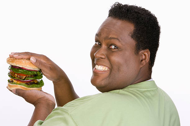 istock Mid-adult overweight man 525369297