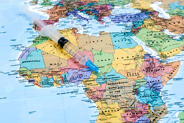 istock syringe on a map of africa 525370139