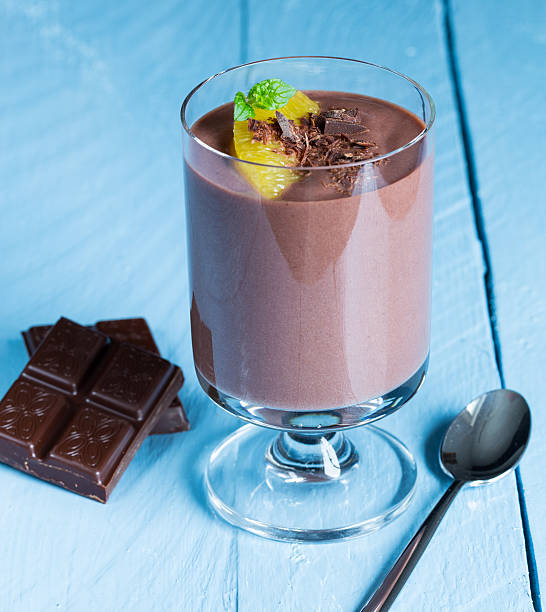 istock Chocolate pudding dessert with orange and pistachio 525378803