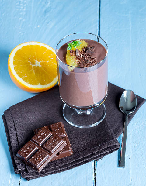 istock Chocolate pudding dessert with orange and pistachio 525378807