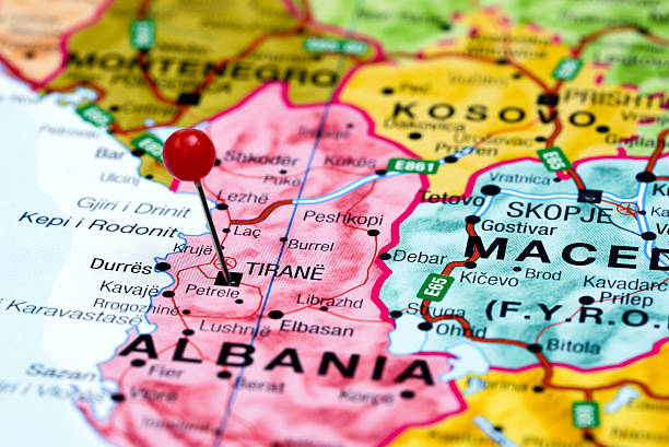 Tirane pinned on a map of europe Photo of pinned Tirane on a map of europe. May be used as illustration for traveling theme. albania stock pictures, royalty-free photos & images