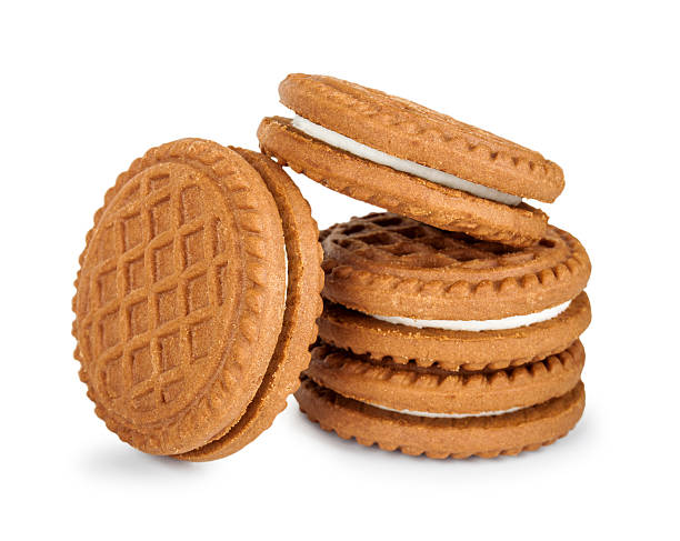 istock stack of cookies with cream isolated on white background 525382759