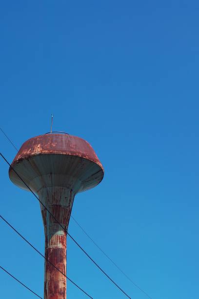 istock old water tank with the blue sky 2 525385137