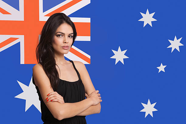 istock Young woman in front of flag 525415931