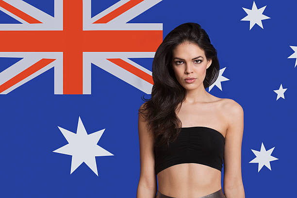 istock Young woman in front of flag 525415935