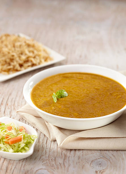 istock Dhansak curry with brown rice, India 525416303