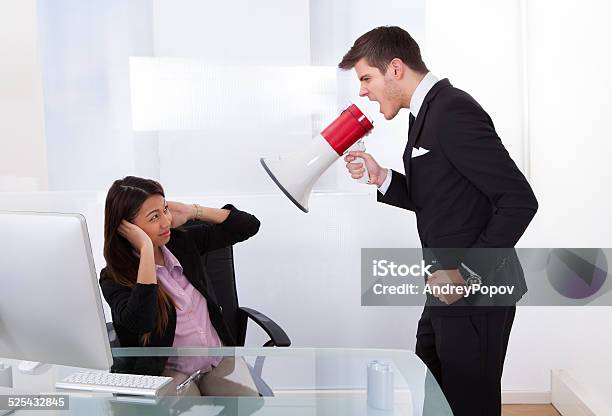 Businessman Scolding Businesswoman Stock Photo - Download Image Now - Adult, Bossy, Bullying