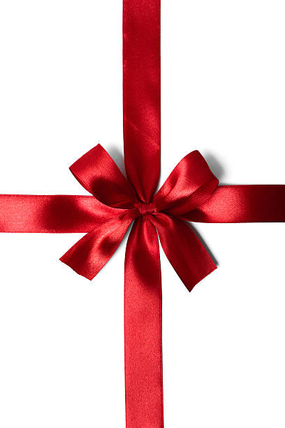 istock Shiny red satin ribbon on white background 525433041