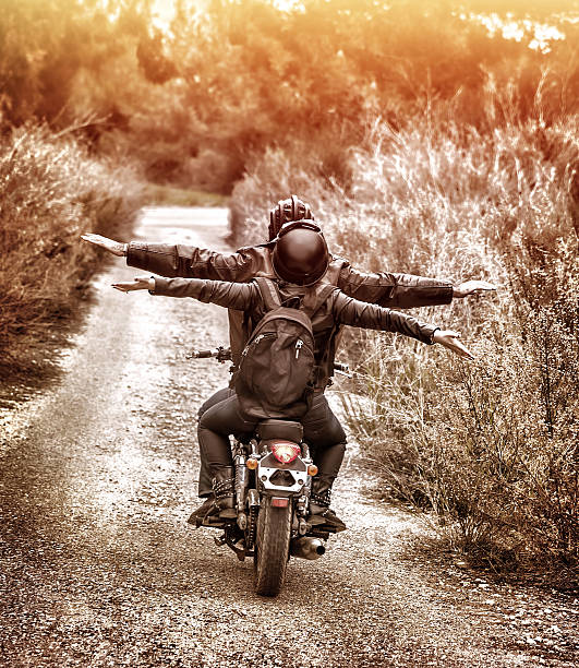 istock Riding on motorbike with pleasure 525433211