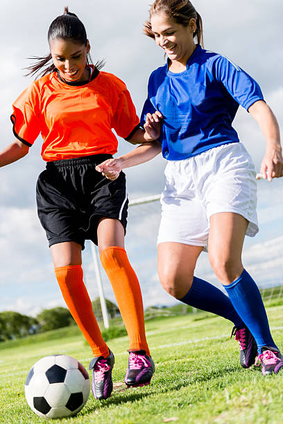 istock Women playing football 525435487