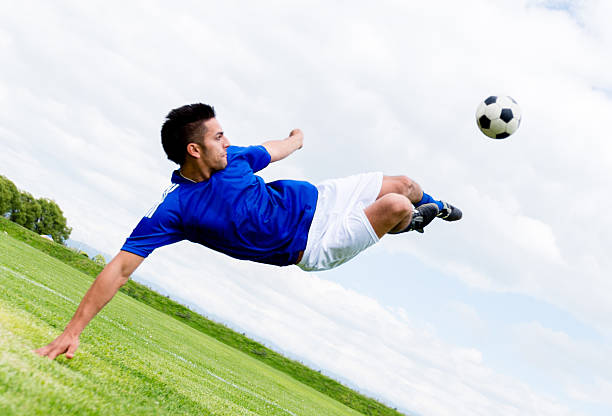 istock Soccer player kicking the ball 525435491