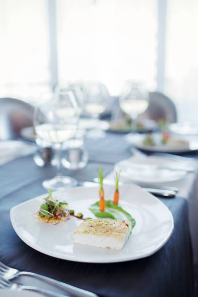 istock Fancy fish meal on plate in restaurant 525441039