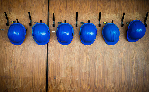 set of protective helmets hanging on the hanger
