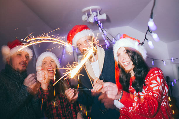 istock Smiling happy people on New Year's Eve 525449279