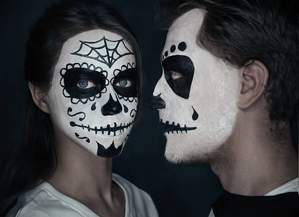 istock Couple in love with Halloween face art 525451315