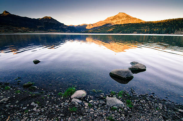 istock William's lake, pagosa springs, colorado sunset and reflection 525451393