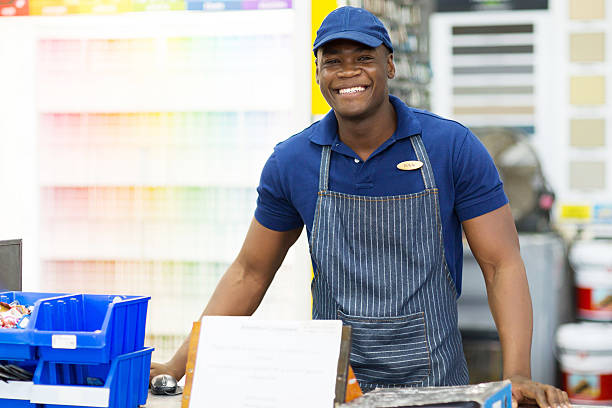 african american hardware store worker portrait of african american hardware store worker brokers stock pictures, royalty-free photos & images