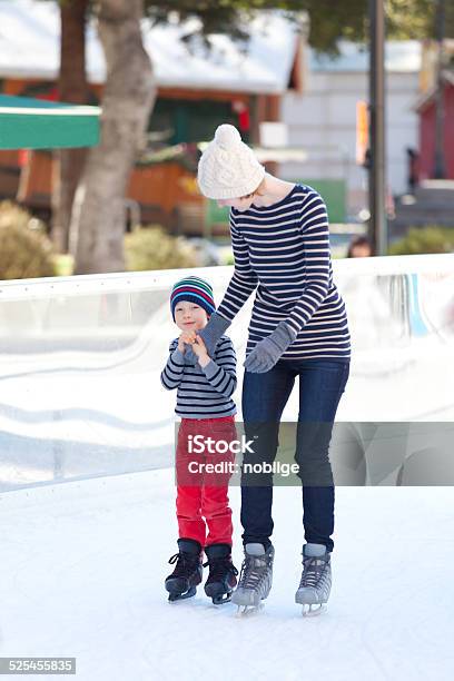 Family Ice Skating Stock Photo - Download Image Now - Active Lifestyle, Activity, Adult