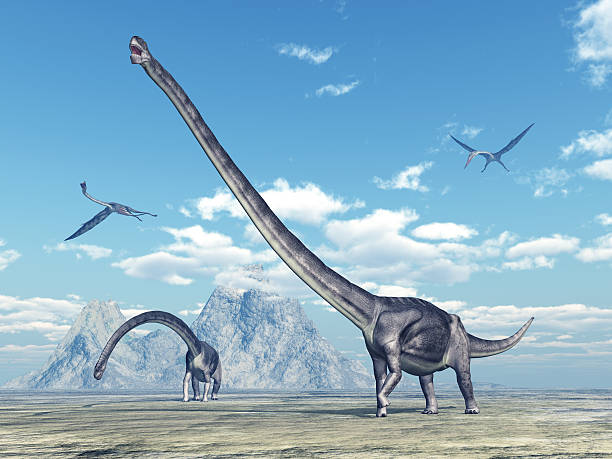 istock Dinosaur Omeisaurus and pterosaur Quetzalcoatlus 525478220