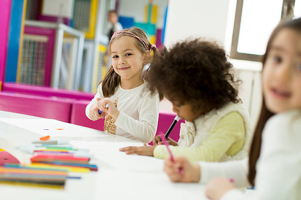 istock Multiracial children drawing in the playroom 525479206